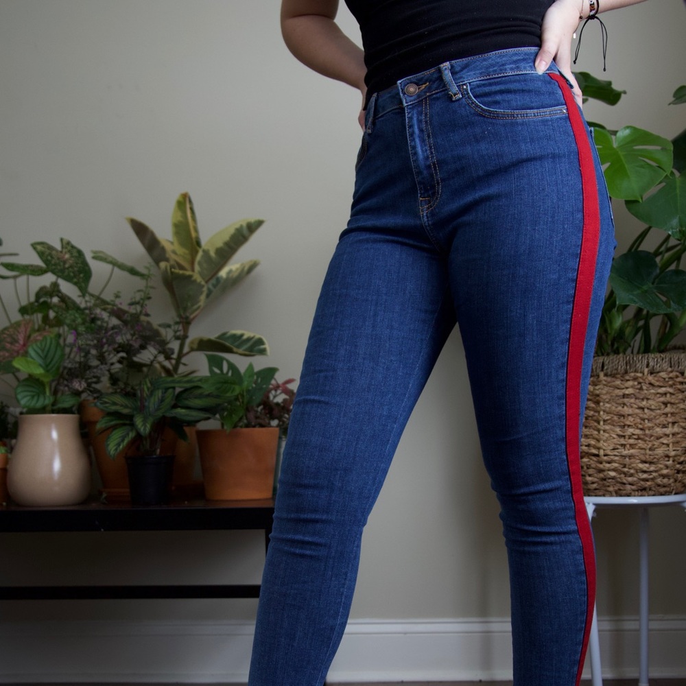 Skinny jeans with red tuxedo stripe